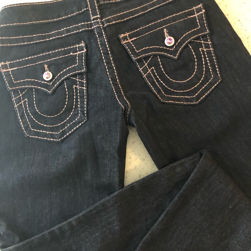 True Religion ladies size 27 straight leg jeans.